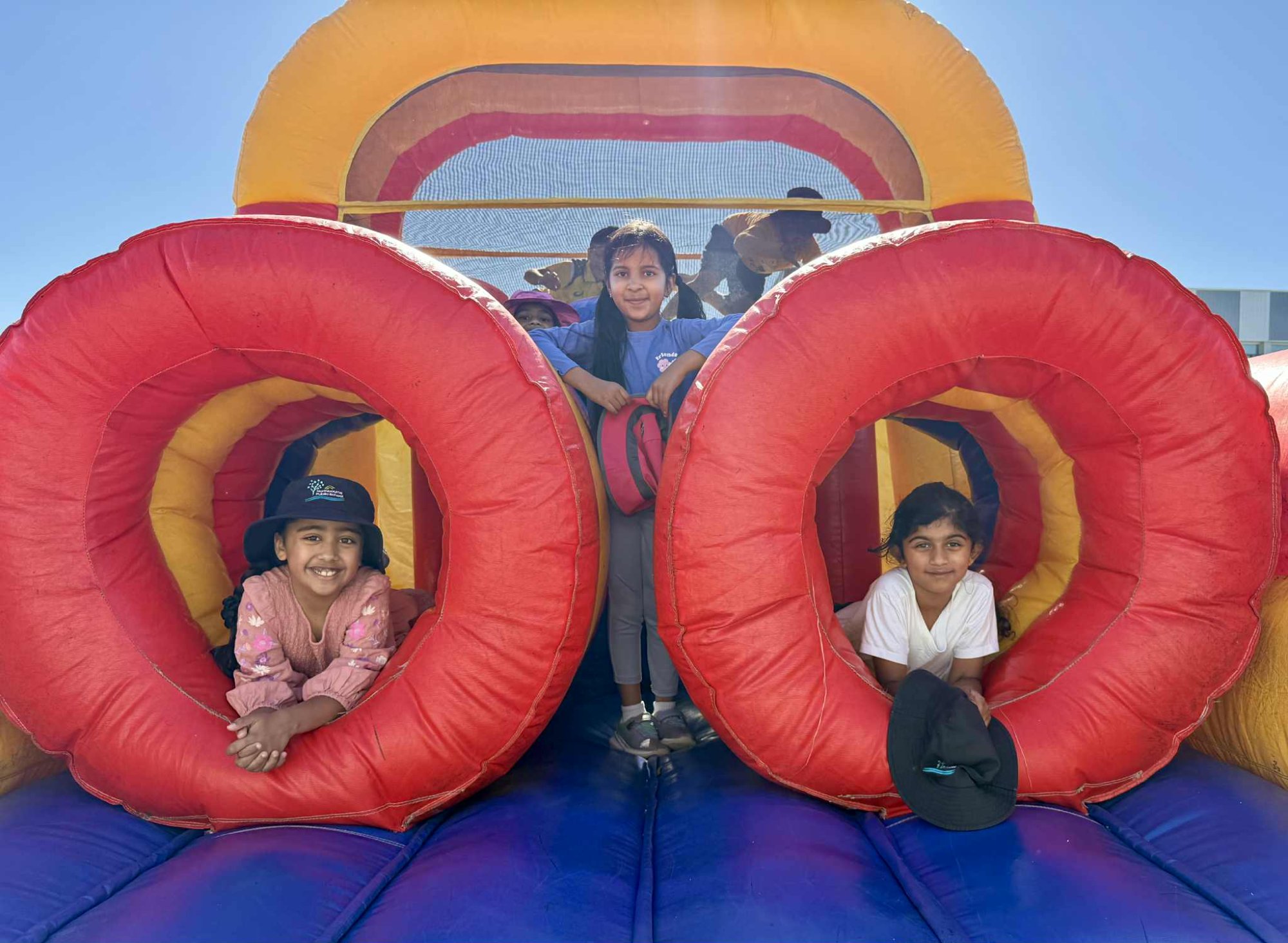 Kids on inflatable slide